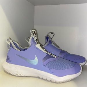 Nike Flex Runner Running Shoes
Size 6Y
Color light purple and white